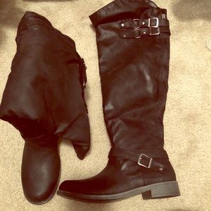 Black just fab, knee length boots.